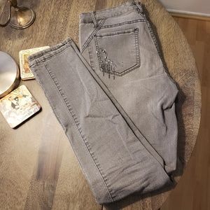 Studded skinny jeans